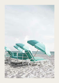 Photograph of turquoise umbrellas and sun loungers on beach-3