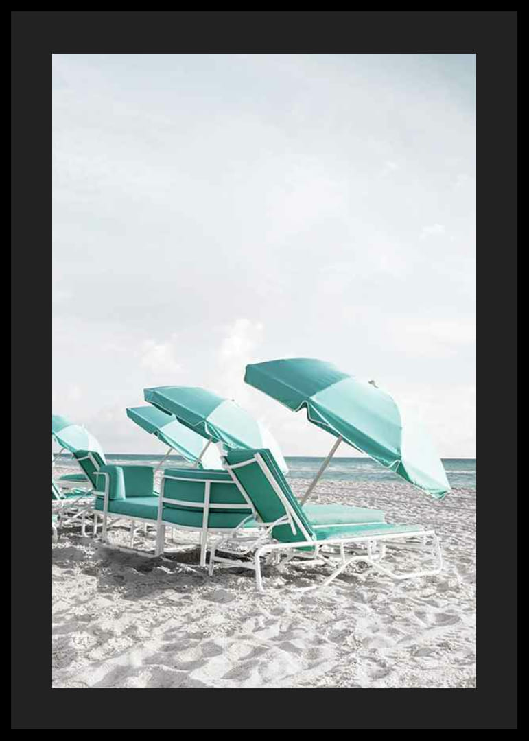 Photograph of turquoise umbrellas and sun loungers on beach-12