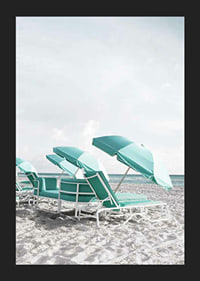 Photograph of turquoise umbrellas and sun loungers on beach-5