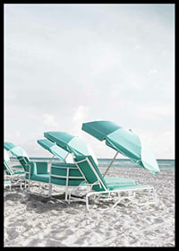 Photograph of turquoise umbrellas and sun loungers on beach-6