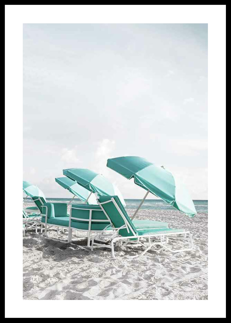 Photograph of turquoise umbrellas and sun loungers on beach-12