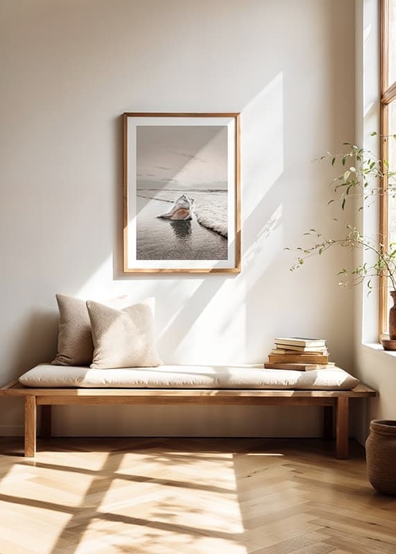 Photograph of seashells on the shore with soft beige tones-12