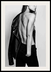 Black and white photo of young woman in jeans with leather jacket-2