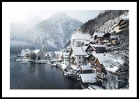 Photograph of Hallstatt by the lake, snow-covered houses and mountains-0