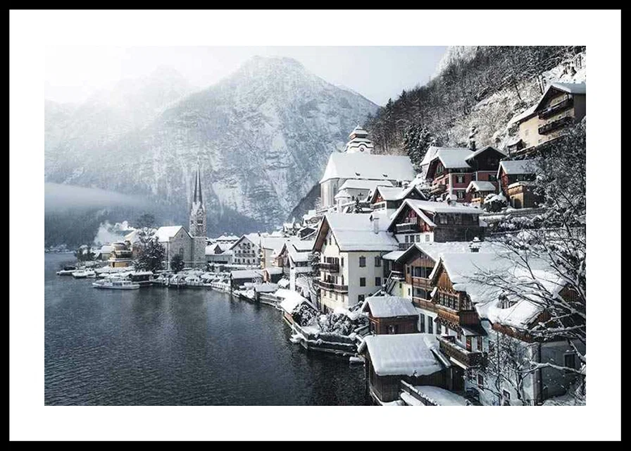 Photograph of Hallstatt by the lake, snow-covered houses and mountains-12