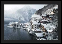Photograph of Hallstatt by the lake, snow-covered houses and mountains-4