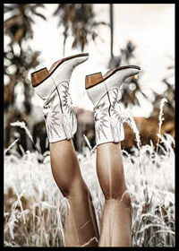 Photograph of legs with white cowboy boots in grass field-6