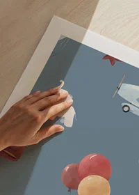 Illustrated elephants, airplanes and hot air balloons against a blue background-9