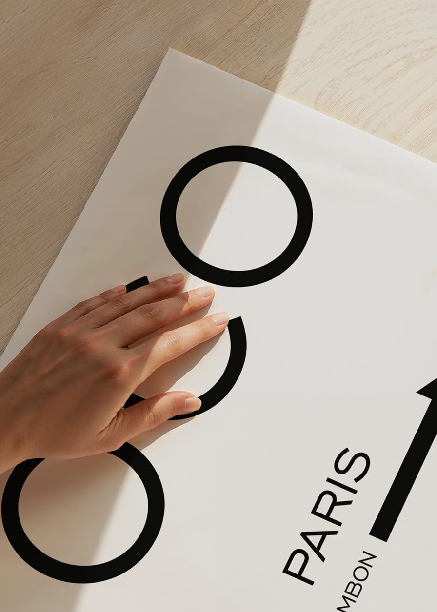 Minimalist black text COCO Paris 31 Rue Cambon arrow-12