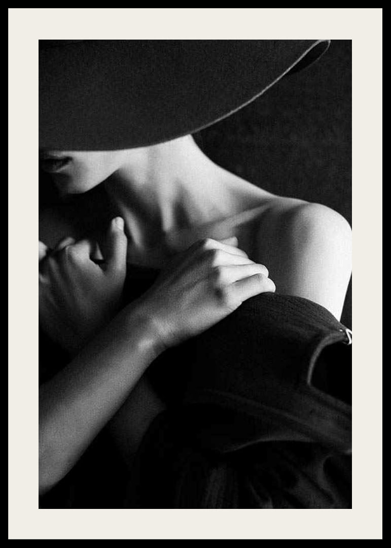 Black and white fashion photography of woman with hat in profile-12