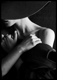 Black and white fashion photography of woman with hat in profile-6