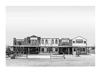 Black and white photo of historic wooden buildings on Route 66-1