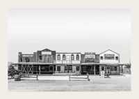 Black and white photo of historic wooden buildings on Route 66-3