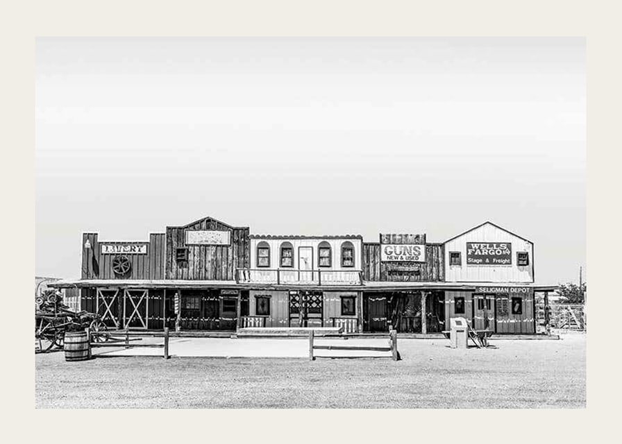 Black and white photo of historic wooden buildings on Route 66-12