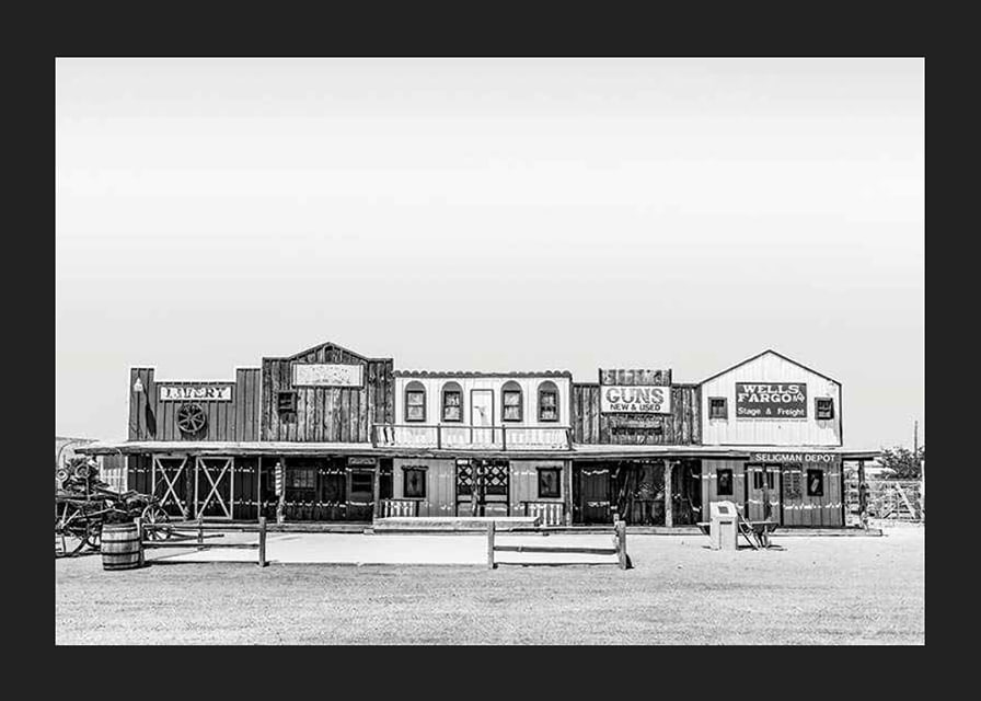 Black and white photo of historic wooden buildings on Route 66-12