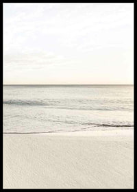 Photograph of calm sea at the beach in light beige tones-6