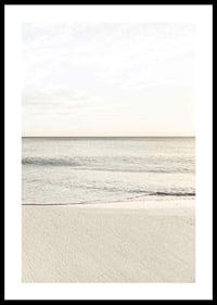 Photograph of calm sea at the beach in light beige tones-0