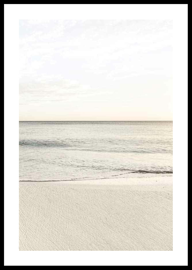 Photograph of calm sea at the beach in light beige tones-12