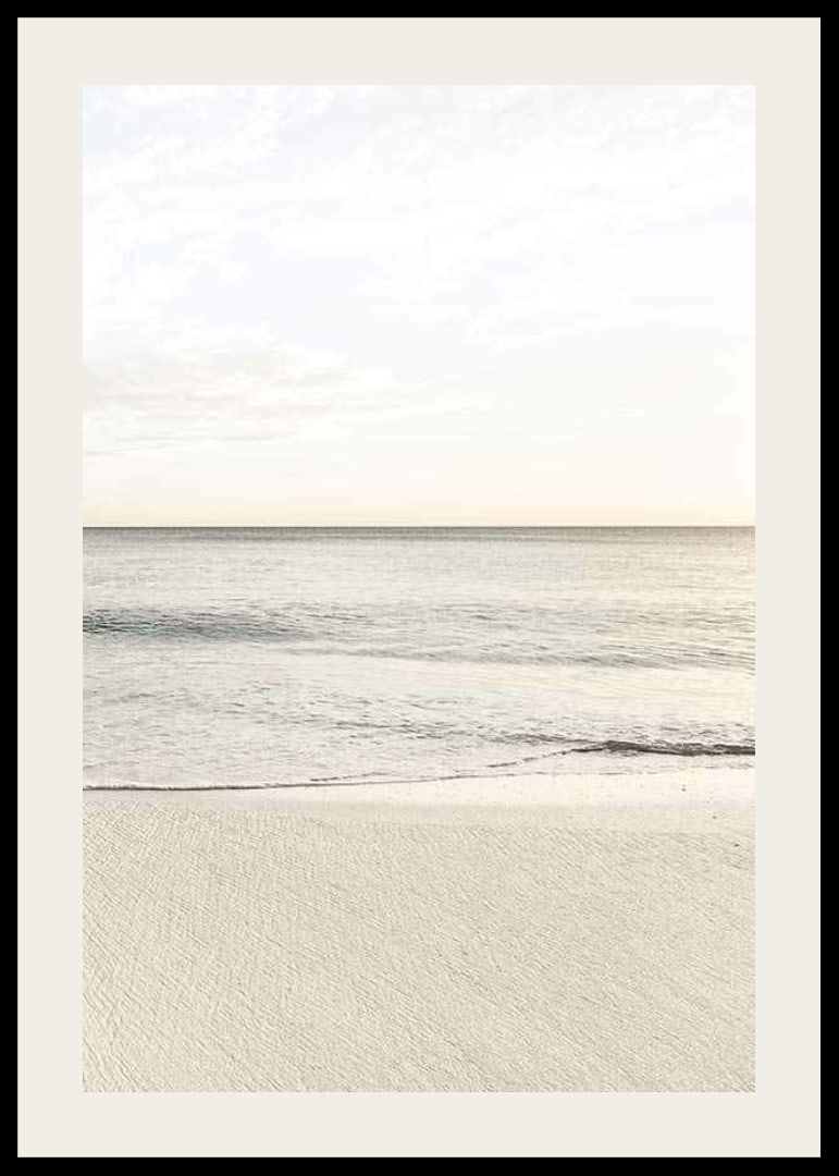 Photograph of calm sea at the beach in light beige tones-12
