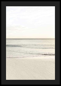 Photograph of calm sea at the beach in light beige tones-4
