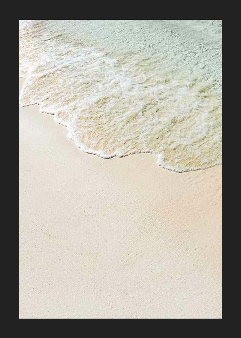 Fotografi av mjukt vågskum mot sandstrand i pastelltoner-12
