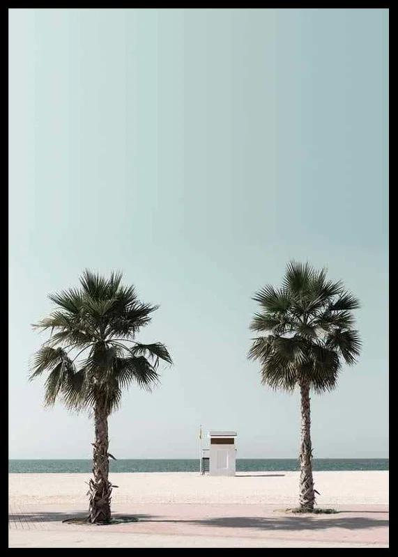Photographic view of two palm trees and lifeguard tower at beach-12