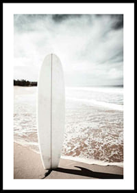 Photographic surfboard standing in the sand at the ocean's edge-0