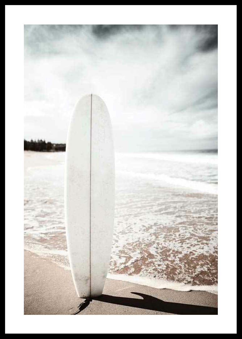 Photographic surfboard standing in the sand at the ocean's edge-12