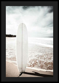 Photographic surfboard standing in the sand at the ocean's edge-4