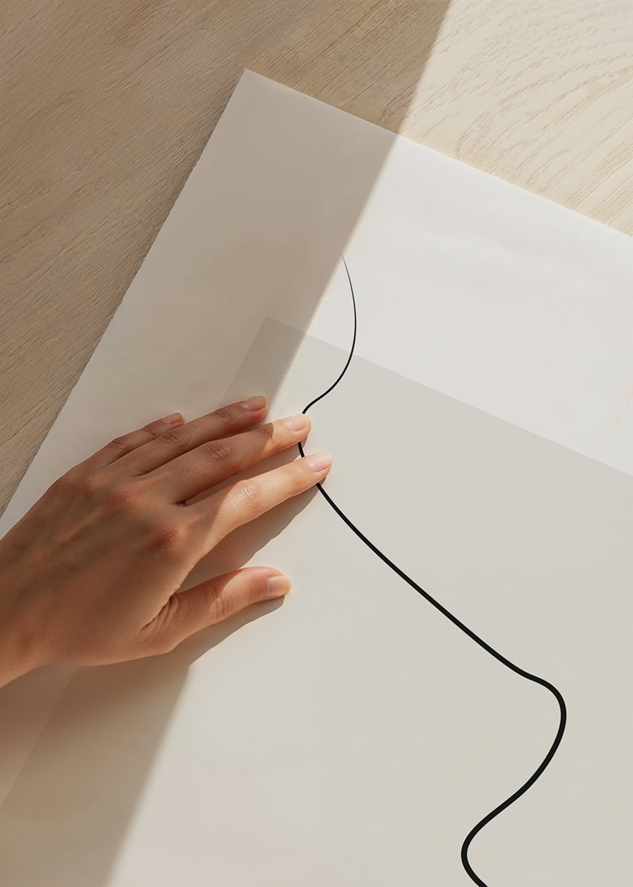 Minimalist line drawing of face profile on beige surface-12