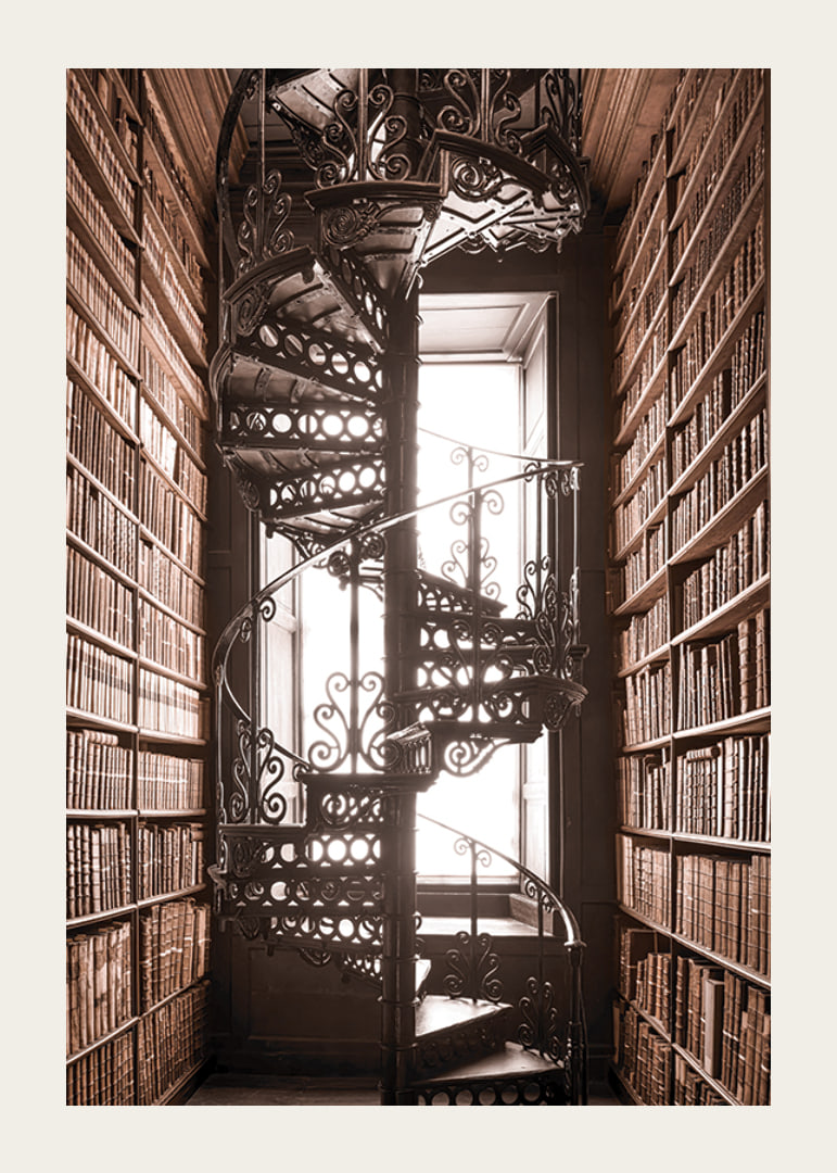 Photograph of spiral staircase in historic library with books-12