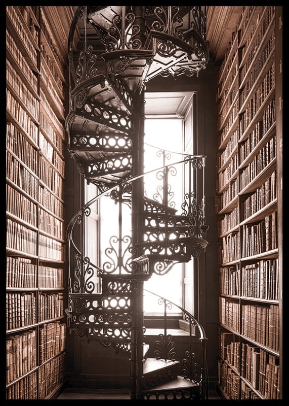 Photograph of spiral staircase in historic library with books-12