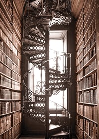Photograph of spiral staircase in historic library with books-7