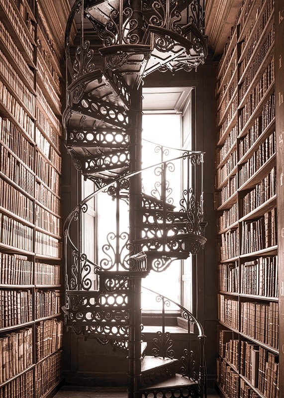 Photograph of spiral staircase in historic library with books-12