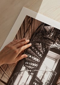 Photograph of spiral staircase in historic library with books-9