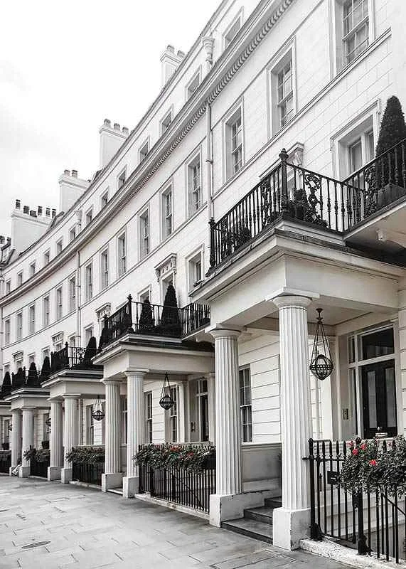 Photograph of white Georgian townhouses with wrought iron details-12