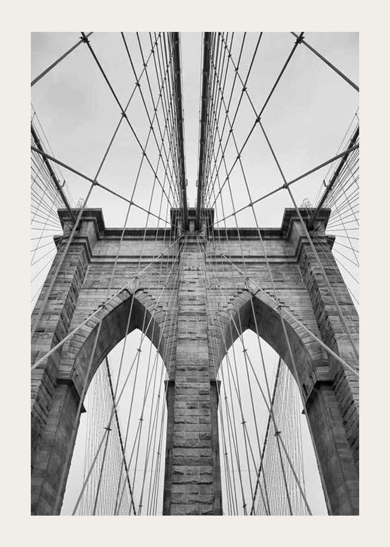 Black and white close-up of Brooklyn Bridge with cables and arches-12