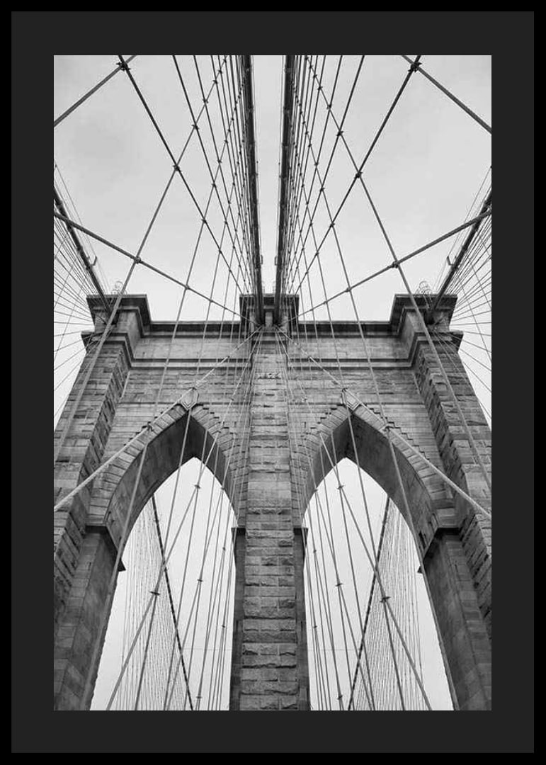 Black and white close-up of Brooklyn Bridge with cables and arches-12