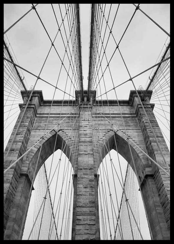 Black and white close-up of Brooklyn Bridge with cables and arches-12
