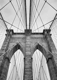 Black and white close-up of Brooklyn Bridge with cables and arches-7