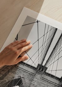 Black and white close-up of Brooklyn Bridge with cables and arches-9