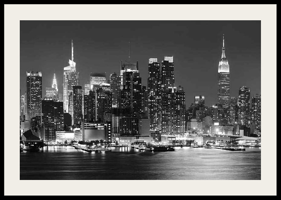 Black and white photograph of Manhattan skyline at night-12