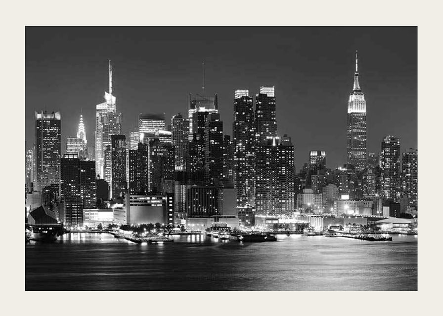 Black and white photograph of Manhattan skyline at night-12