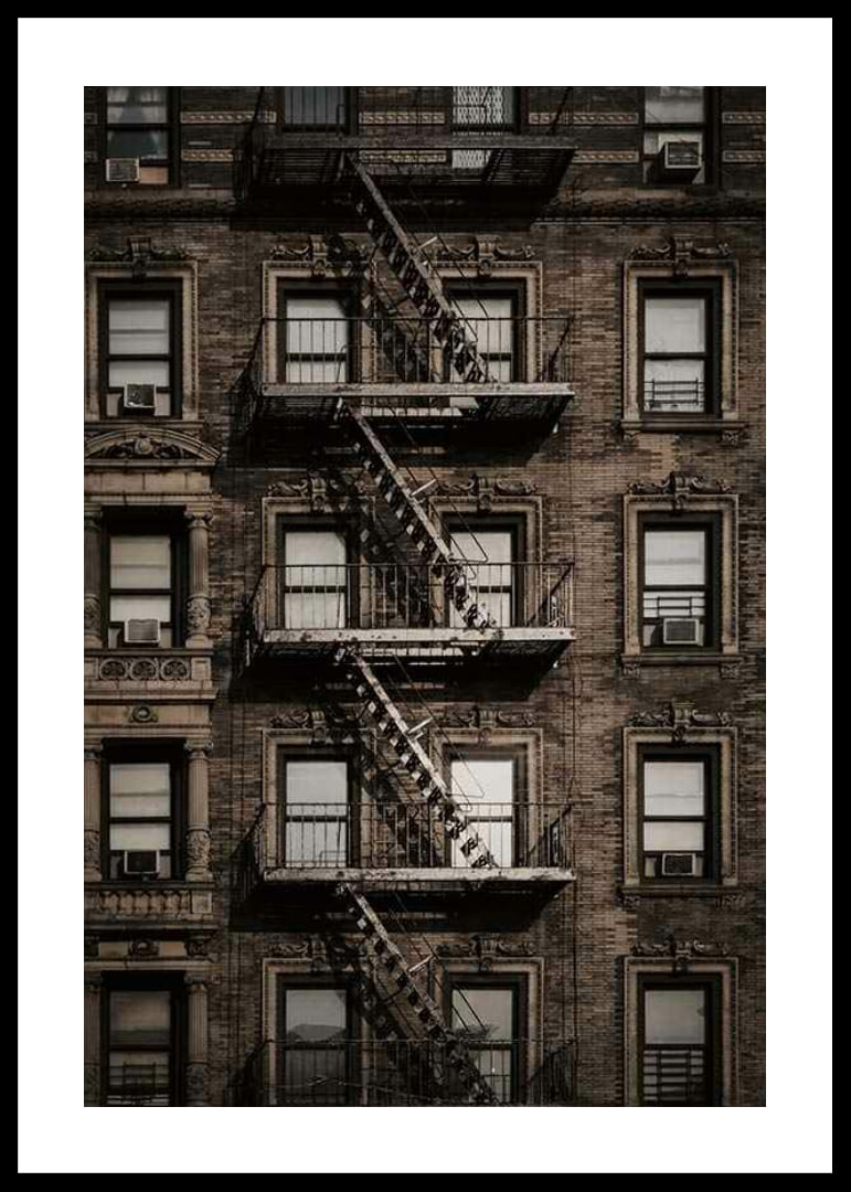 Photographic view of brick building with fire escape in New York-12