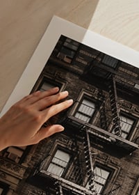 Photographic view of brick building with fire escape in New York-9