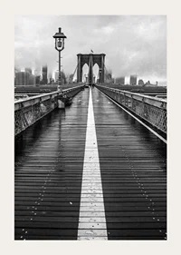 Black and white photograph of Brooklyn Bridge with wet wooden surface-3