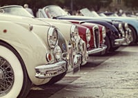 Photographic classic vintage cars in a row, cream and red-7