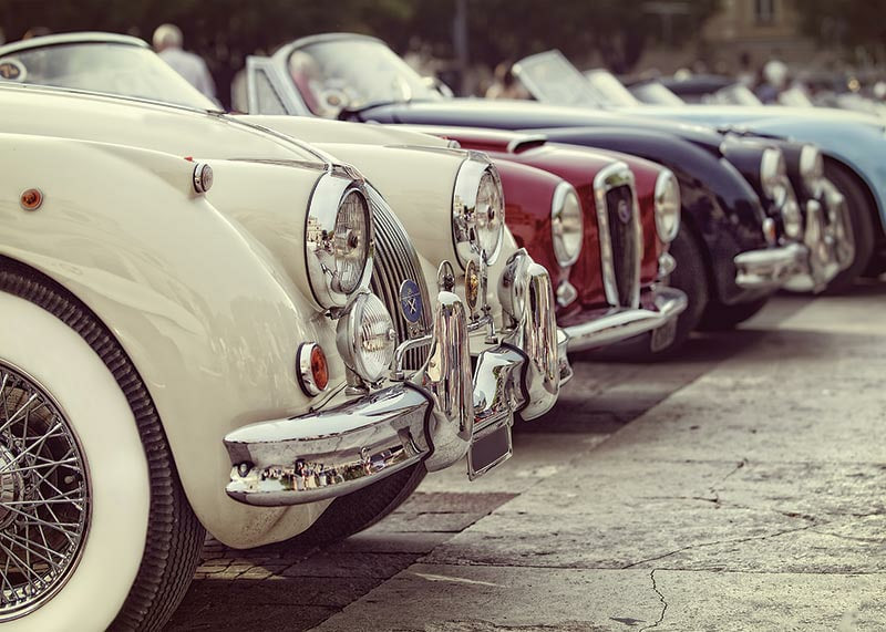 Photographic classic vintage cars in a row, cream and red-12