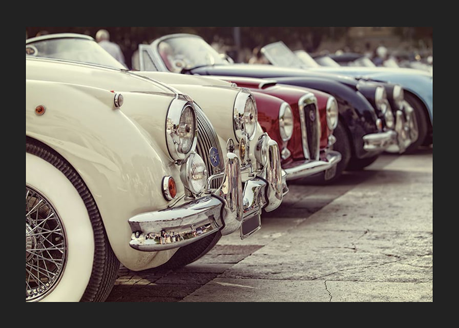 Photographic classic vintage cars in a row, cream and red-12