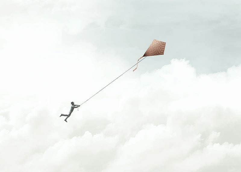 Illustration of man flying with kite among bright clouds-12